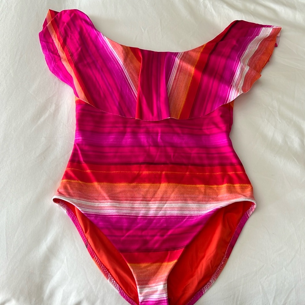 Trina Turk off the shoulder one piece suit.